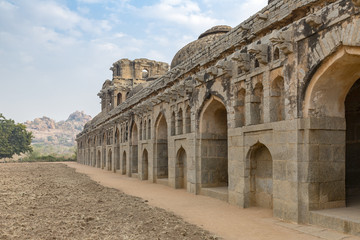 syncretic style monument Elephant Stables, Hampi, Karnataka, India