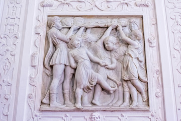 Ornamental allegoric bas-relief marble sculpture with childrens playing