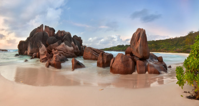 Beach on La Digue island with typical rock formation, Seychelles, scenic panorama