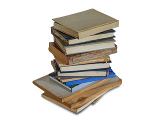 A stack of dusty shabby books on a white background, isolated