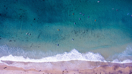 Surfers and surfboards from above in La Jolla, California