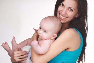 happy mother holding baby