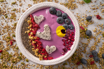 Acai bowl smoothie pitaya hearts blueberry goji