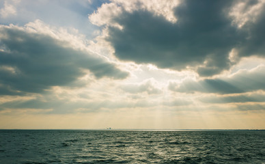 Sunstreaks through clouds over Lake Ray Hubbard in Texas.