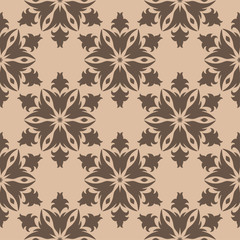 Brown floral seamless design on beige background