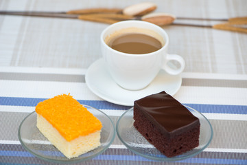 A cup of coffee and Chocolate and golden threads cake