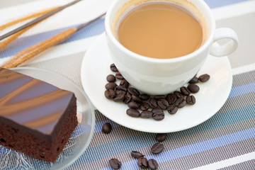 A cup of coffee and Chocolate cake