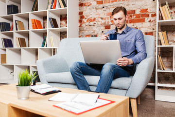 Young man with a laptop