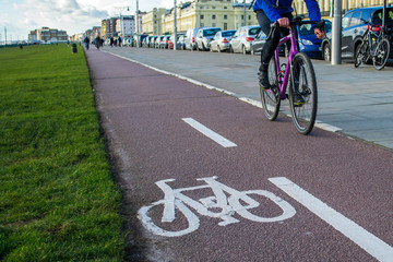 Obraz premium Cycle lane with cyclist riding a bike