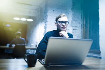 Young man with a laptop