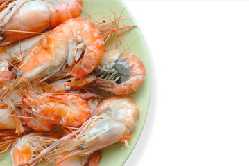 Steamed prawns in  plate  put on  white floor.
