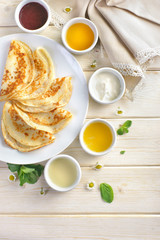 pancakes on wooden background