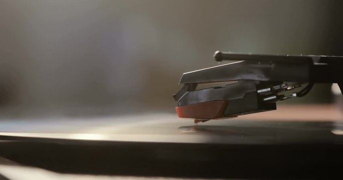 Close up of vinyl record on DJ turntable record player