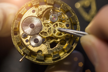 Process of installing a part on a mechanical watch, watch repair