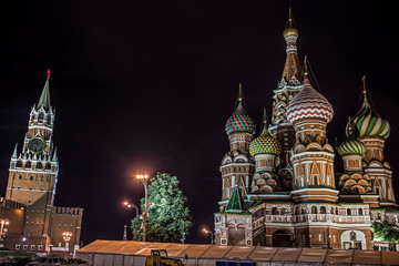 Fototapeta na wymiar Famous Saint Basil's Cathedral and Kremlin illuminated in the Evening, Red Square, Moscow, Russia