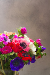 Anemones flowers on stone background