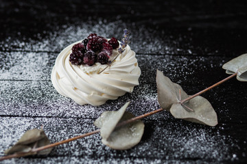 Pavlova cakes with cream and fresh summer berries - 192381966