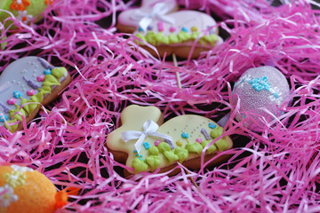 Homemade Easter bunny cookies in pink nest