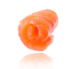 Slice of red fish close-up on a white background