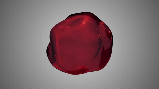 red liquid molecule or water drop floating in zero gravity. the sphere from the liquid flies and deforms into zero gravity. loopable ultra hd 3840 2160 animation plus alpha channel
