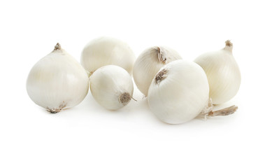 Fresh ripe onions on white background