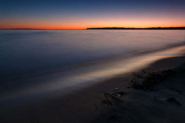 Fototapeta na wymiar sandy beach after sunset