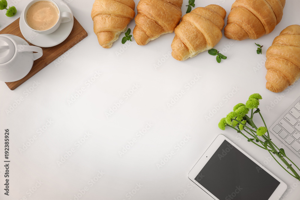 Poster flat lay composition with tasty croissant and cup of coffee on table