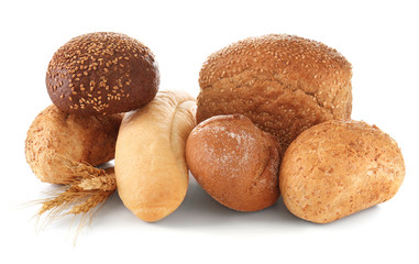 Variety of fresh tasty bread on white background