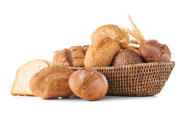 Composition with wicker basket and different bread isolated on white