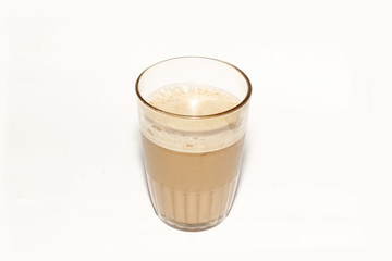 Tea with milk or popularly known as Teh Tarik isolated in white