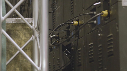 Electrician engineer tests electrical installations and wires on relay protection system. Bay...