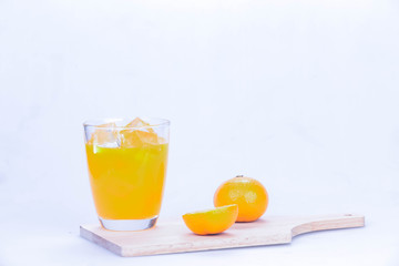 Orange Juice with White Wood Cutting Board