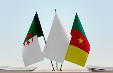 Flags of Algeria and Cameroon with a white flag in the middle