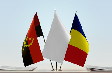 Flags of Angola and Chad with a white flag in the middle