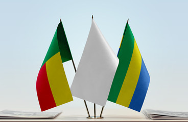 Flags of Benin and Gabon with a white flag in the middle
