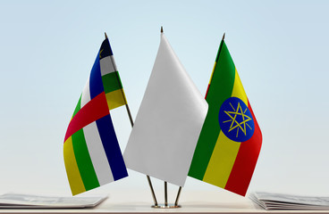 Flags of Central African Republic and Ethiopia with a white flag in the middle