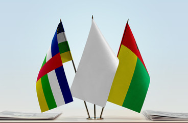 Flags of Central African Republic and Guinea-Bissau with a white flag in the middle
