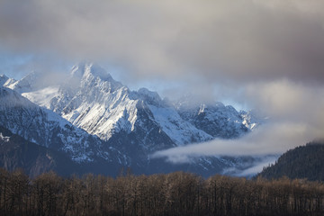 Fototapeta na wymiar Chilkat mountains with clearing fog