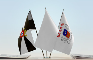 Flags of Ceuta and Mayotte with a white flag in the middle