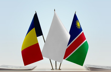 Flags of Chad and Namibia with a white flag in the middle