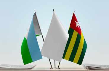 Flags of Djibouti and Togo with a white flag in the middle