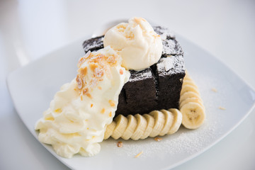 Charcoal toast with ice-cream, fresh banana and whipped cream