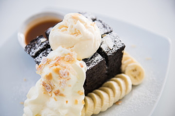 Charcoal toast with ice-cream, fresh banana and whipped cream