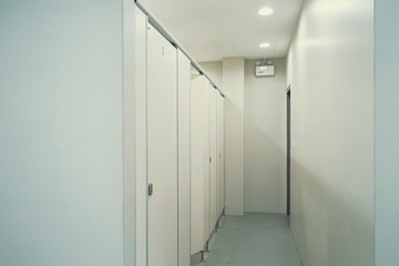 Fototapeta na wymiar Clean white public toilet at airport 