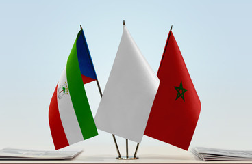 Flags of Equatorial Guinea and Morocco with a white flag in the middle