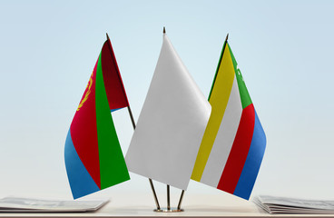 Flags of Eritrea and Comoros with a white flag in the middle