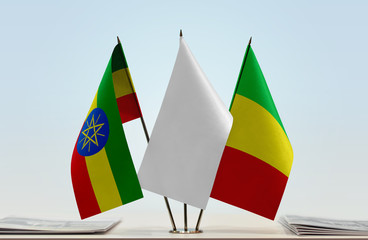 Flags of Ethiopia and Mali with a white flag in the middle
