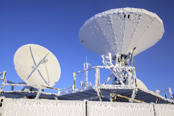 Satellite antenna agaist blue sky