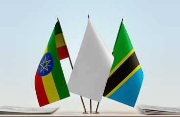 Flags of Ethiopia and Tanzania with a white flag in the middle