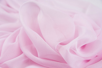 Texture chiffon fabric pink color for backgrounds
